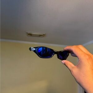 Black Sunglasses with Blue Mirrored Lenses Oakley Oakleys